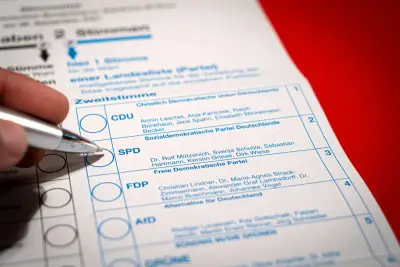 Person filling out a rental agreement form